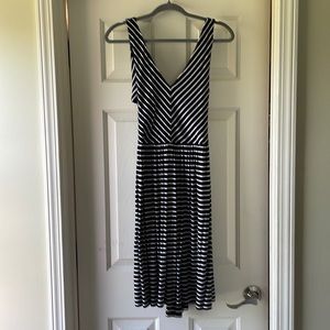 Loft women’s size medium/tall black and white dress. With crisscrossed back.
